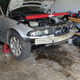 Nervously supporting the engine with Harbor Freight engine support bar. It worked great!